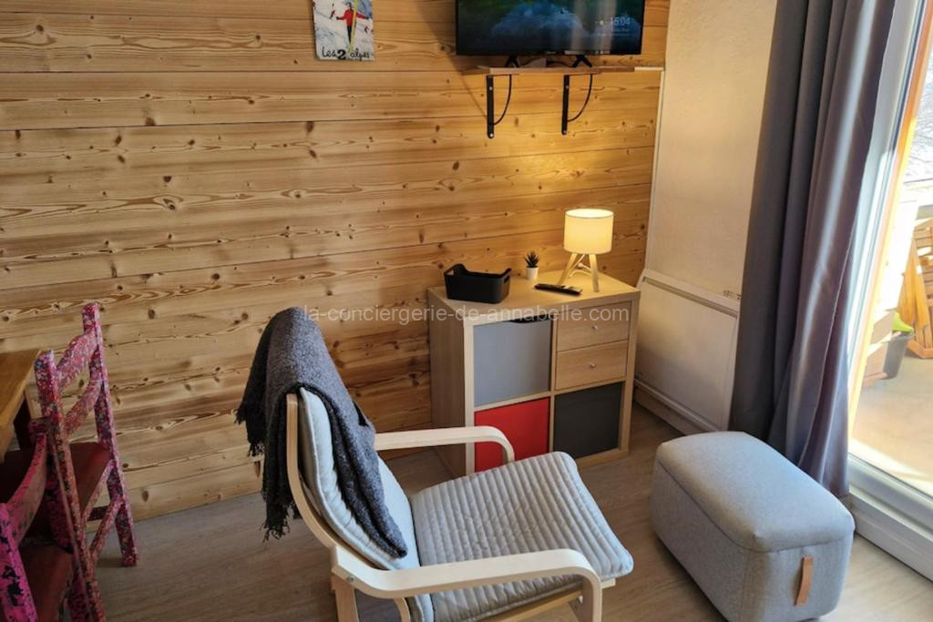 Photo de Cozy T1 with balcony on the snow front